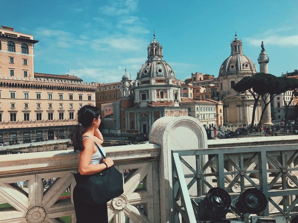 guide to traveling rome with a view of piazza venezia